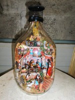 Presepe in damigiana da 5 litri senza tagliare con statuine in terracotta di 5 cm e luci !!!